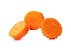 Front view of orange carrot slices isolated on white background with clipping path photo