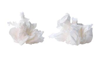 Front view of white screwed or crumpled tissue paper or napkin in set in strange shape after use in toilet or restroom isolated on white background with clipping path photo