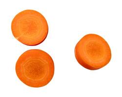 Top view of orange carrot slices in set isolated on white background with clipping path photo