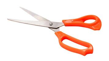 multipurpose scissors with orange handle isolated on white background with clipping path photo