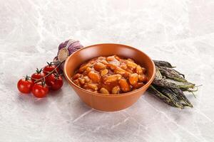 White beans in tomato sauce photo