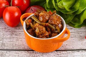 Meatball with vegetables and spices photo