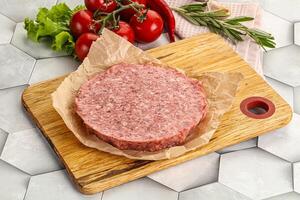 Raw beef uncooked burger cutlet photo