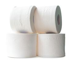 Tissue paper or toilet paper rolls in stack for use in toilet or restroom isolated on white background with clipping path photo