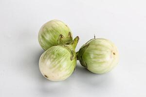 Raw green round eggplant vegetable photo