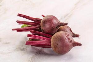 Young raw beetroot heap isolated photo