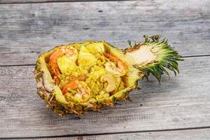 Thai cuisine - rice with prawn in pineapple photo