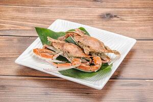 Yummy boiled crab in the plate photo