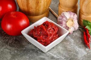 Natural organic red tomato paste photo