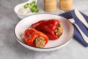 Stuffed bell pepper with minced meat and rice photo