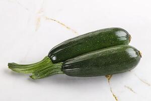 Sliced raw young green zucchini photo