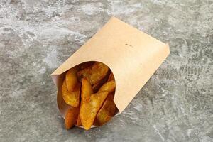 Fried rustic golden potato heap photo