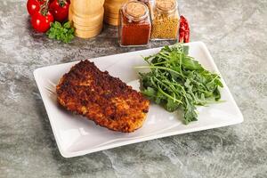 Tasty roasted breaded meat schnitzel photo