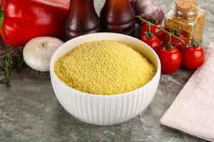 Raw dry wheat couscous grain photo