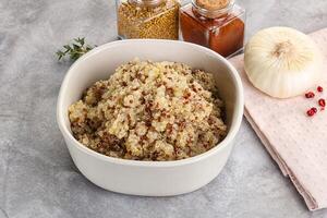 Vegan cuisine - boiled quinoa cereal photo