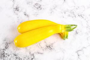 Yellow young zucchini for cooking photo