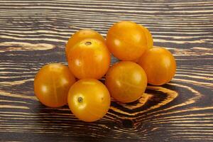 Ripe tasty yellow cherry tomato photo