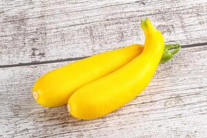 Yellow young zucchini for cooking photo