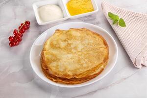 Sweet homemade thick baked pancakes photo