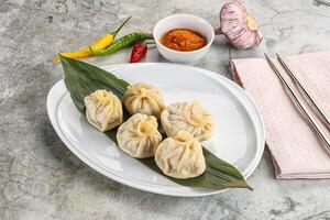 Chinese traditional steamed dumpligs momo photo