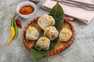 Chinese traditional steamed dumpligs momo photo