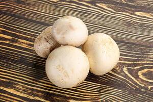 Natural organic ripe champignon mushrooms photo