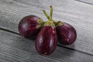 Raw smal asian baby eggplant photo