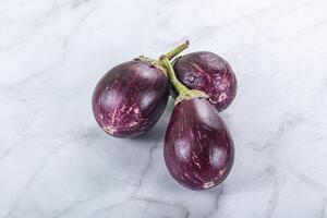 Raw smal asian baby eggplant photo