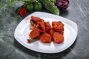 Indian cuisine - chicken tikka barbecue photo