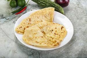 Indian tandori bread - naan with cheese photo