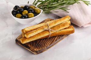 Crispy grissini italian bread heap photo