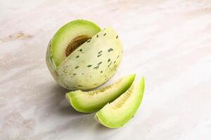 Ripe sweet and juicy dalmatian melon photo