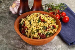 Vegetarian Pasta ptitim with vegetables photo