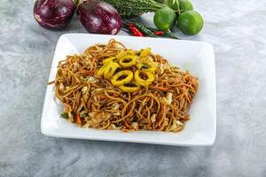 Stir fried noodles with squid photo