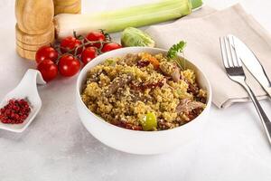 Bulgur with lamb and vegetables photo