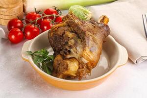 Baked Lamb shank with bone photo