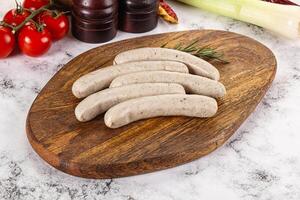 Natural organic raw pork sausages photo