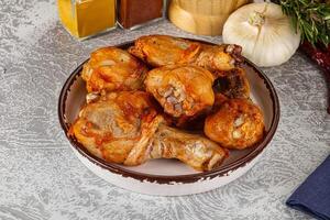 Raw marinated chicken drumstick for cooking photo