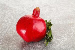 Ripe red sweet and juicy Pomegranate photo