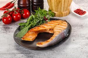 Tasty delicous grilled salmon steak photo