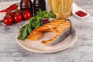 Tasty delicous grilled salmon steak photo
