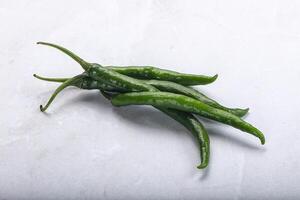 Hot and spicy green chili pepper photo