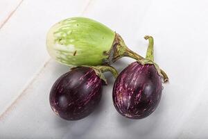 Heap of raw asian baby eggplant photo