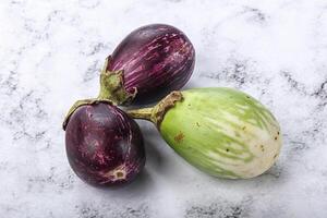 Heap of raw asian baby eggplant photo