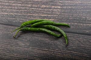 Hot and spicy green chili pepper photo