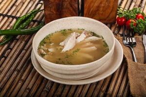 Tasty dietary chicken soup with vegetables photo