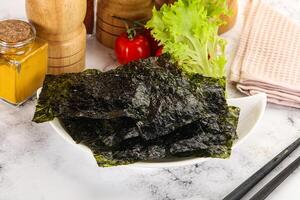 Korean cuisine - Nori chips in the bowl photo