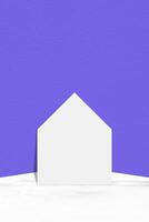 White Paper Cutting House on Marble Table with Light Blue Concrete Wall Background, Suitable for Product Presentation Backdrop, Display, and Mock up for Social Media or Mobile Phone. photo