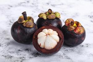 Sweet ripe juicy tropical Mangosteen photo