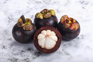 Sweet ripe juicy tropical Mangosteen photo